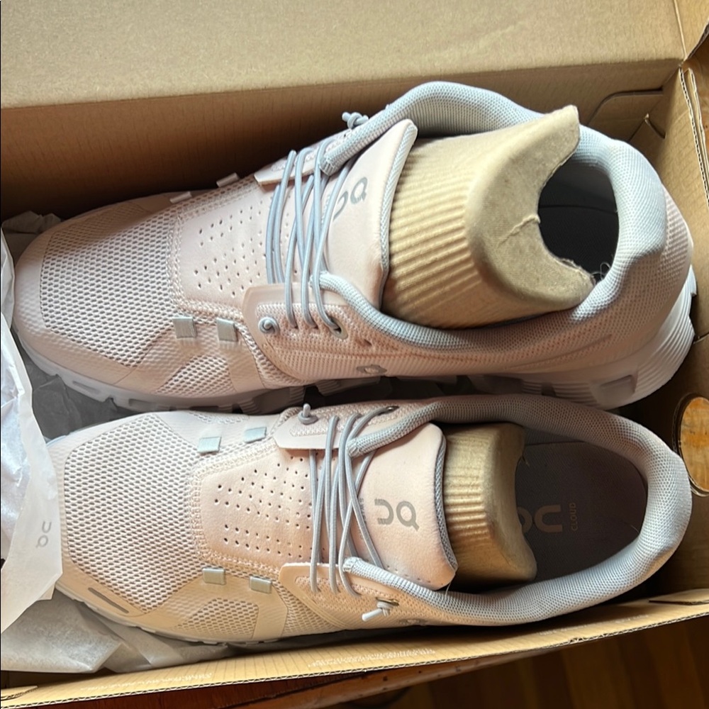 On Running Pink Athletic Shoes with Cushioned Midsole and Breathable Mesh